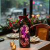 Enchanting Pink and Purple Rose Preserved Flower Wine Bottle - Imaginary Worlds